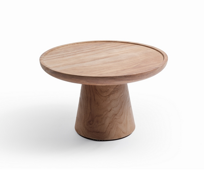 La table TIFNIT en teck recyclé massif de la marque Manufactori est une pièce élégante et authentique. Avec son diamètre de 50 cm et sa hauteur de 30 cm, elle s'intègre parfaitement dans divers espaces, que ce soit comme table basse d'appoint ou élément décoratif.